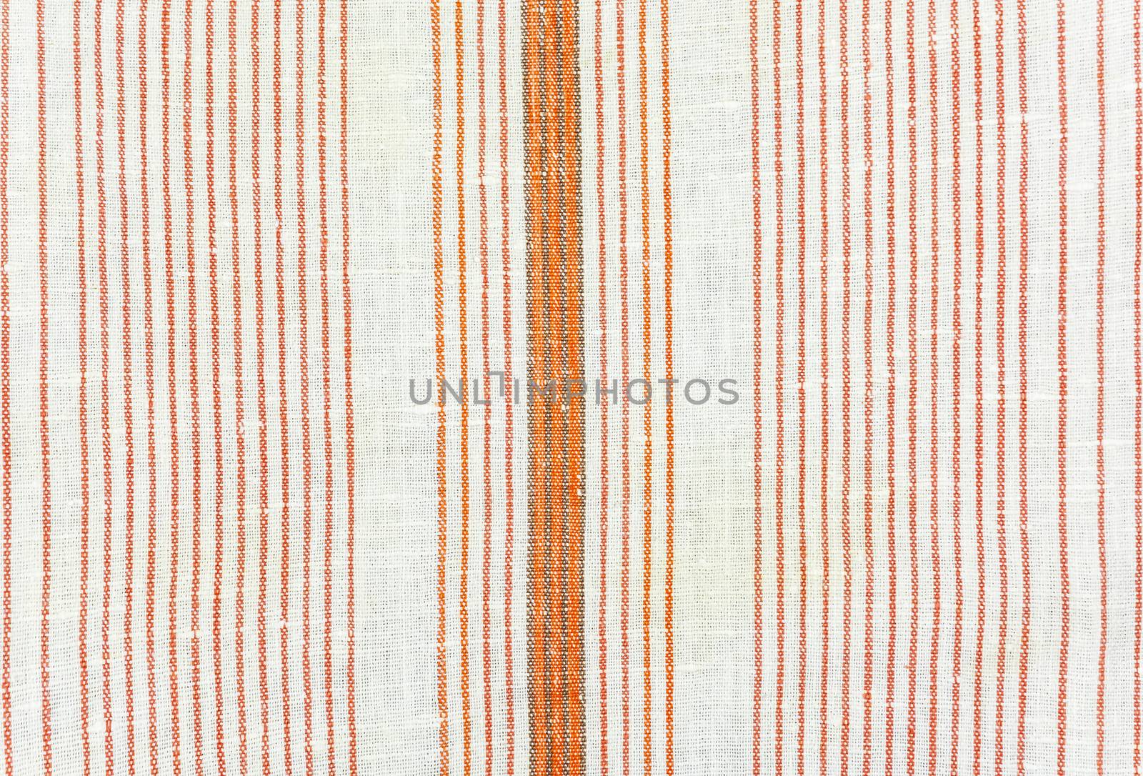 Texture of cotton fabric with vertical red stripes