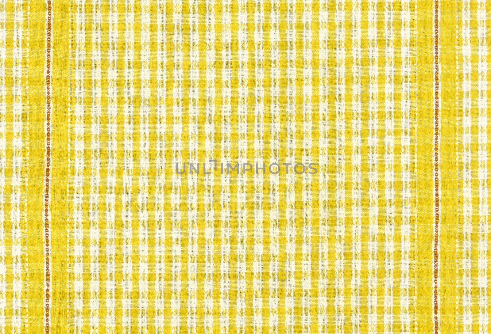 Texture of cotton fabric with a pattern in a box of yellow color