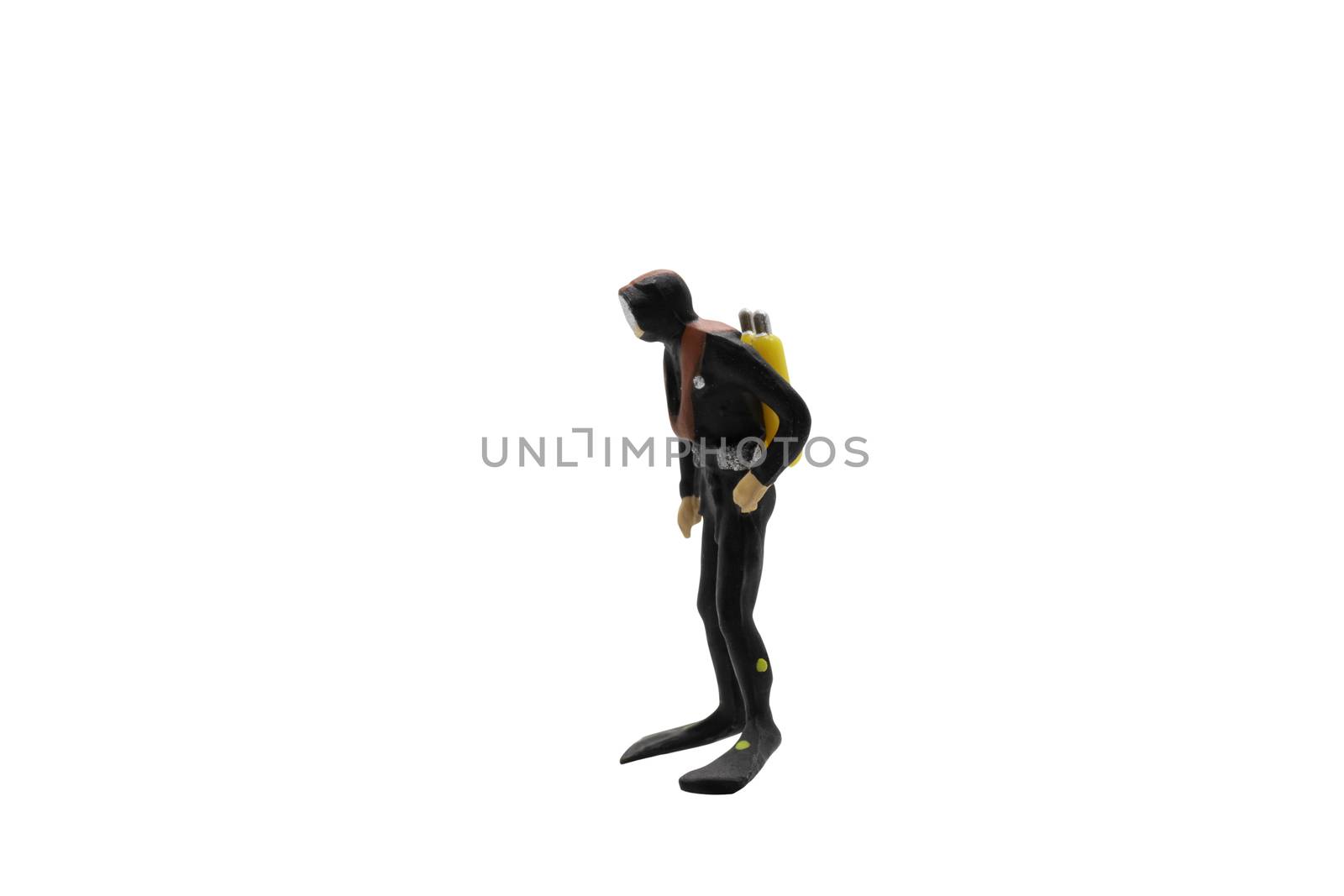 Miniature people : Scuba diver isolated on white background with clipping path