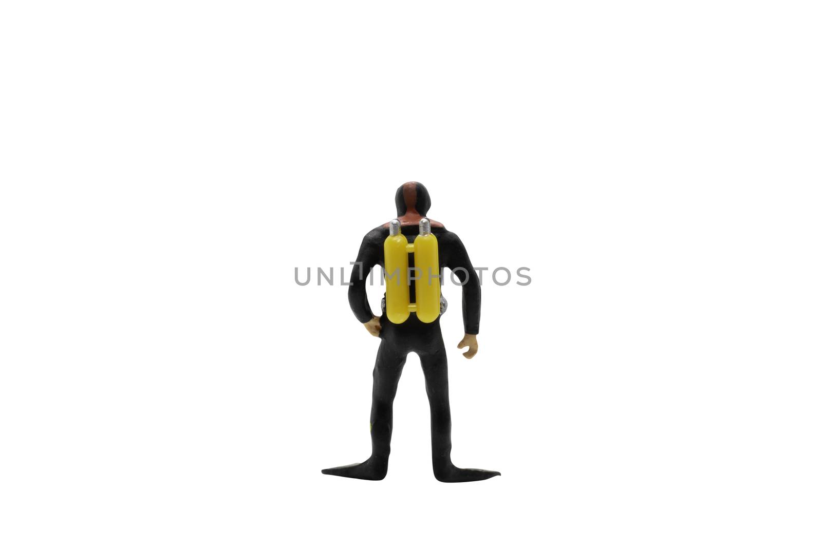 Miniature people : Scuba diver isolated on white background with clipping path