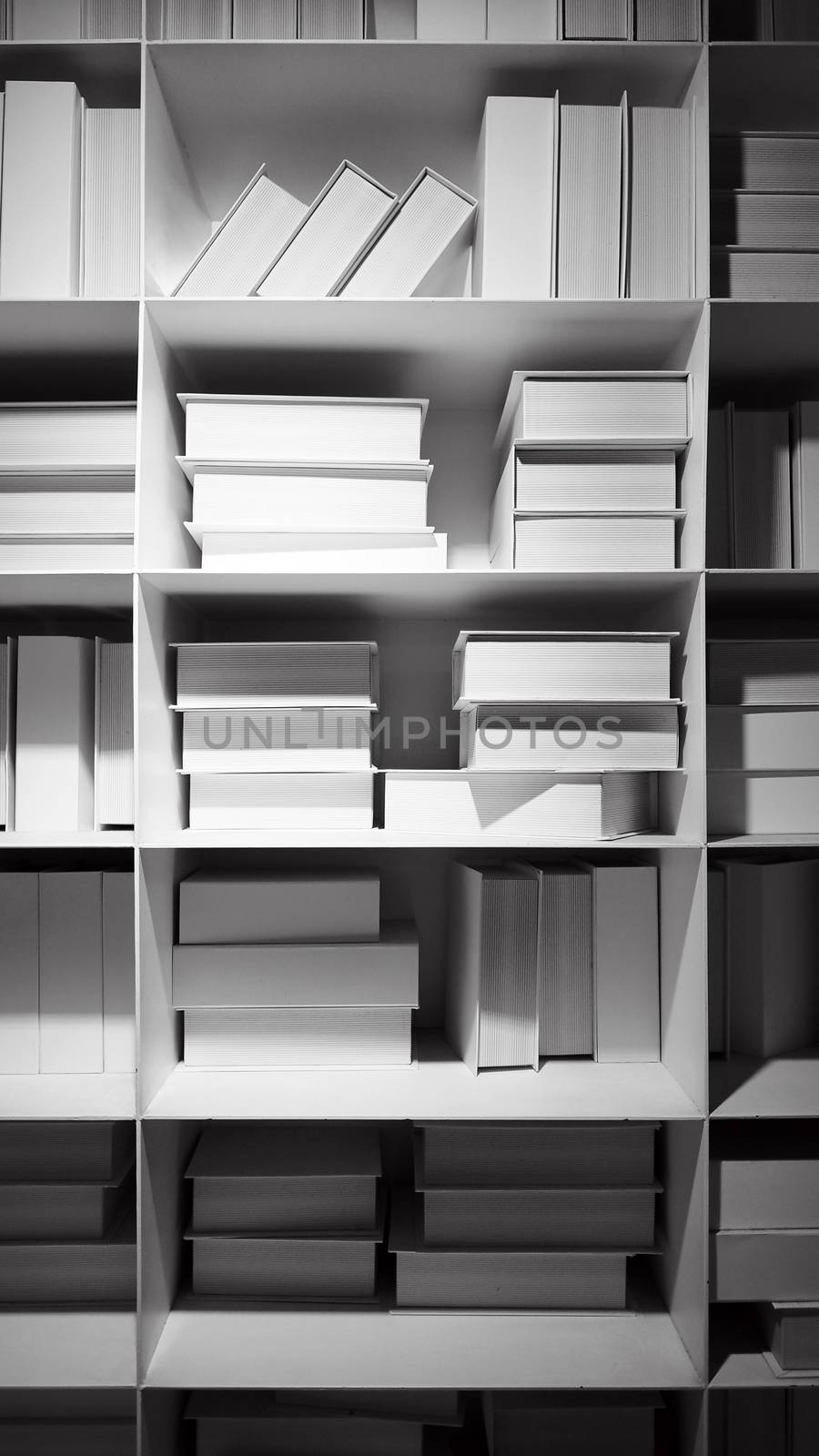 Realistic white color book shelf stack mock up for decoration in reading room which every book designed and made from hardcover paper and align on the wall and represent modern interior design