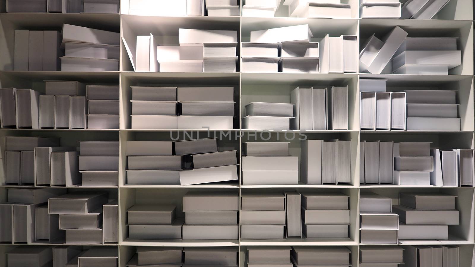 Realistic white color book shelf stack mock up for decoration in reading room which every book designed and made from hardcover paper and align on the wall and represent modern interior design