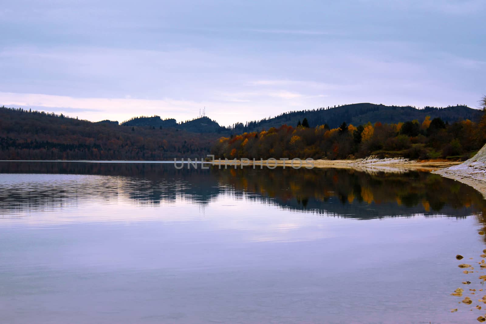 Shaori lake in Racha, Georgia. Lake landscape at autumn time.