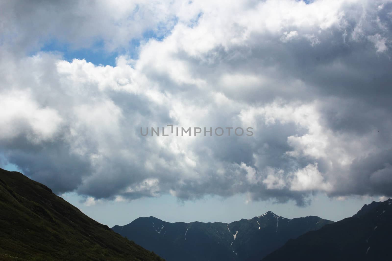 Mountain cloudscape and landscape in Georgia. Horizon in mountain range.