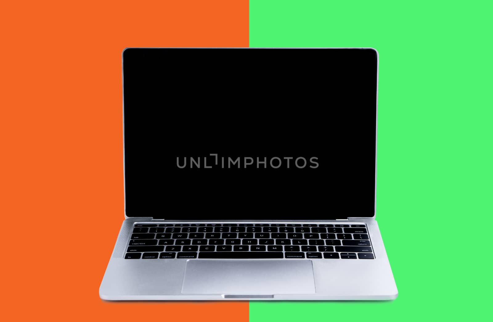 Laptop and mock up screen on color background by Buttus_casso