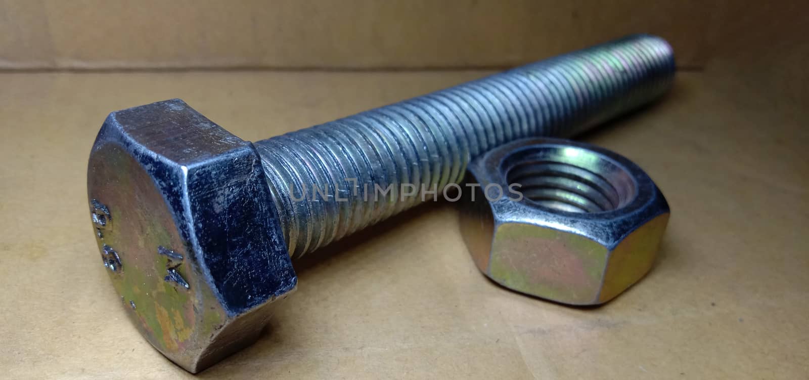 Iron Made Nut and Bolt Closeup by jahidul2358