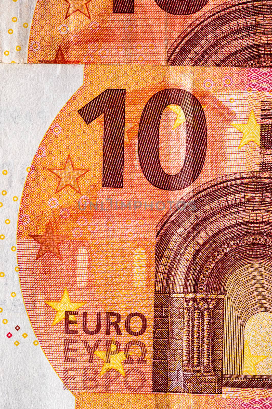 Selective focus on detail of euro banknotes. Close up macro detail of money banknotes, 10 euro isolated. World money concept, inflation and economy concept