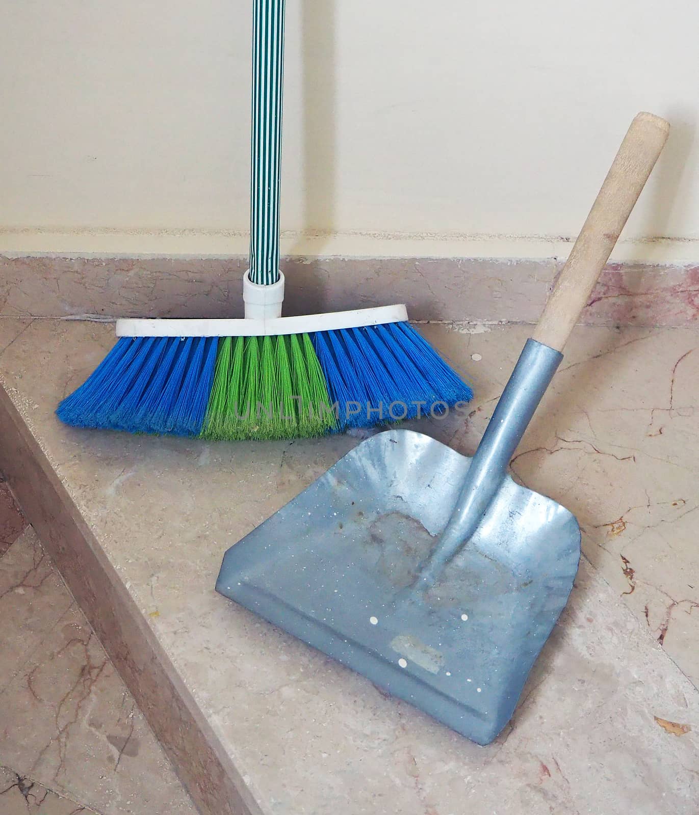 brush and small shovel, building cleaning, cleaning of stairs and corridors,