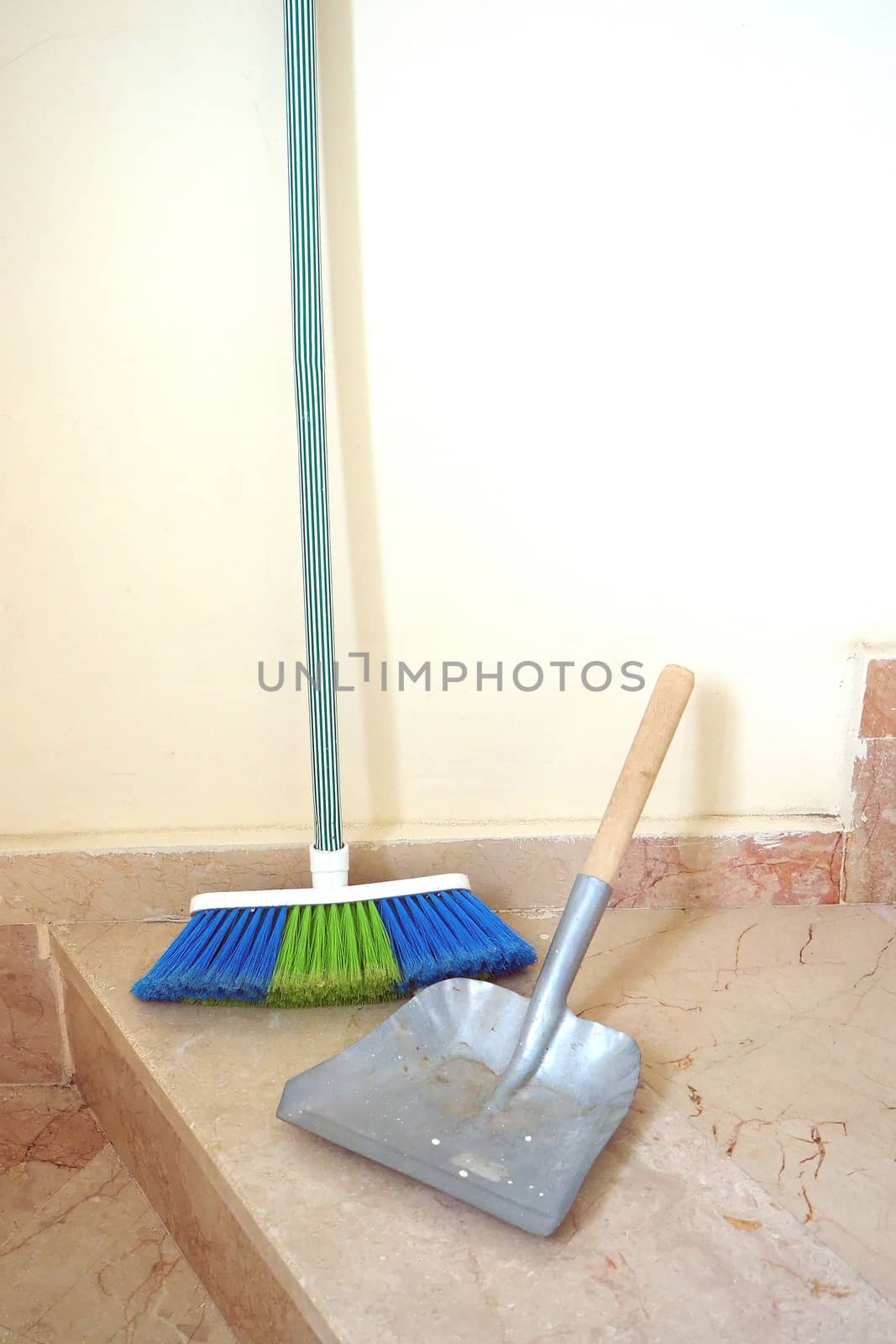 brush and small shovel, building cleaning, cleaning of stairs and corridors,