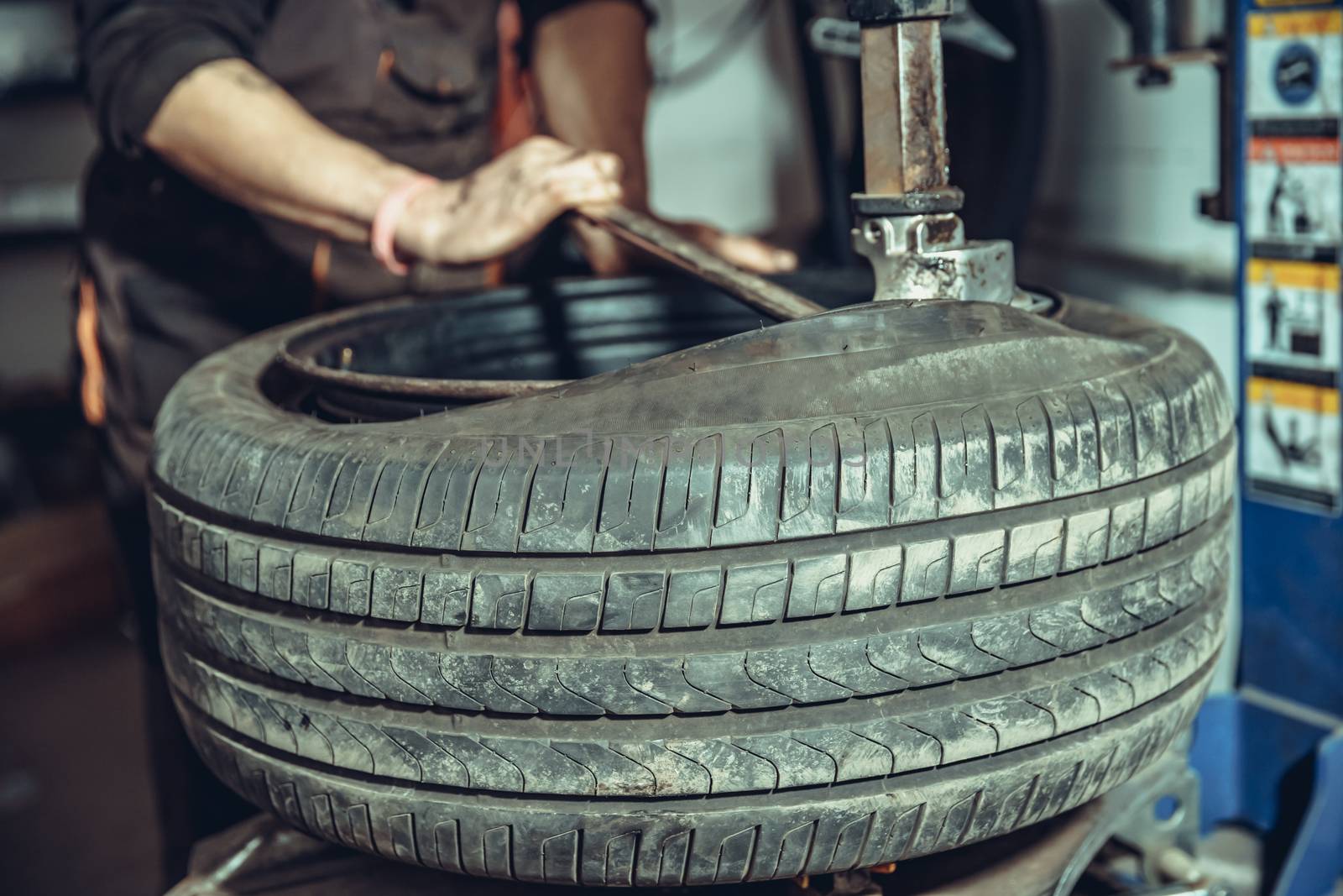 replacement of tires on car wheels.
