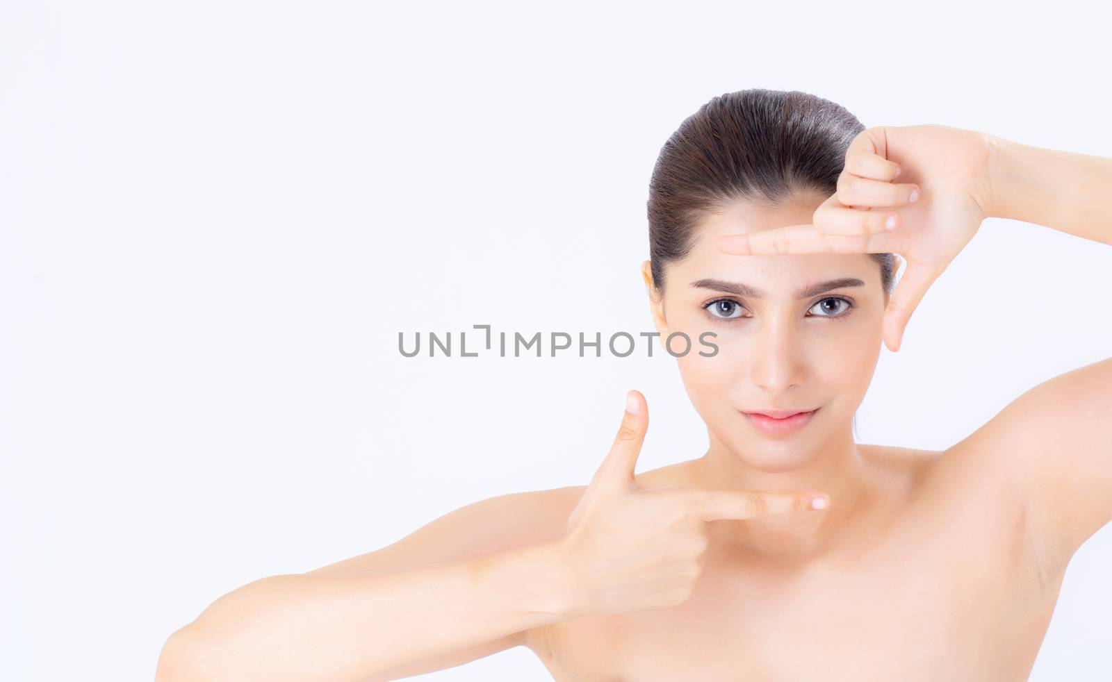 Beauty of portrait asian young woman face and eye care with make up, skincare and cosmetic for wellness, girl with gesture frame with hand shape.