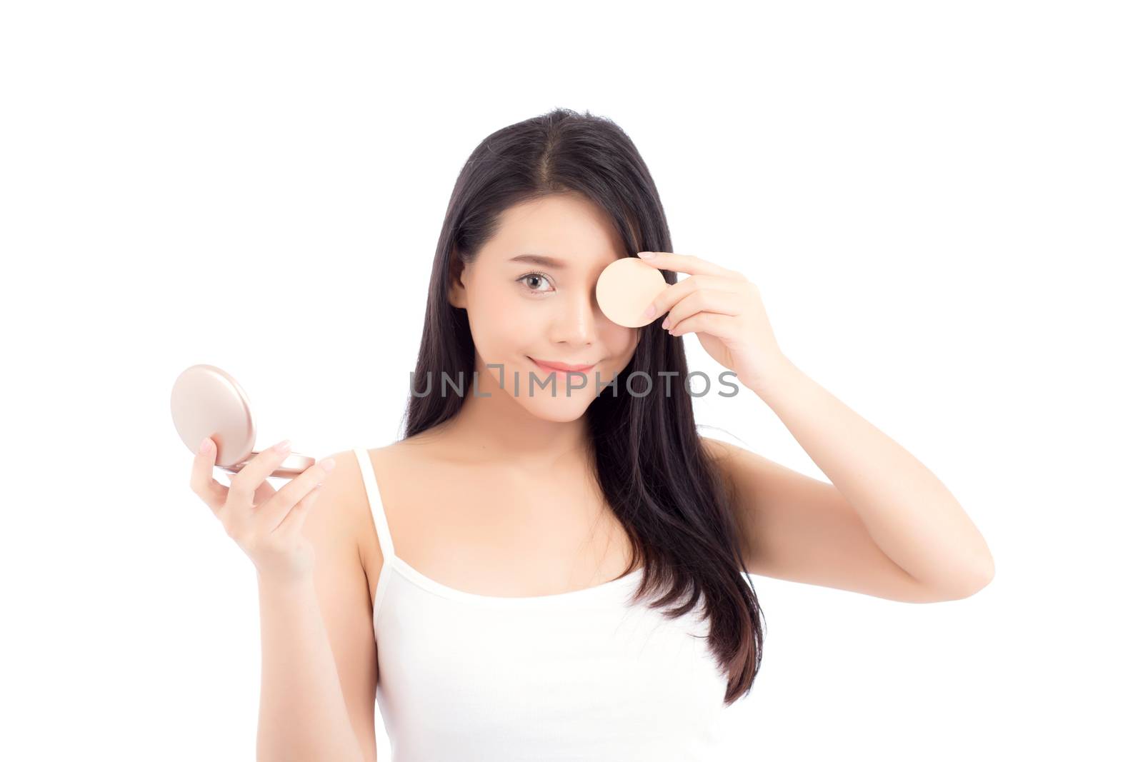 Portrait of beautiful asian woman applying powder puff at cheek makeup of cosmetic, beauty of girl with face smile isolated on white background, wellness and healthcare concept.