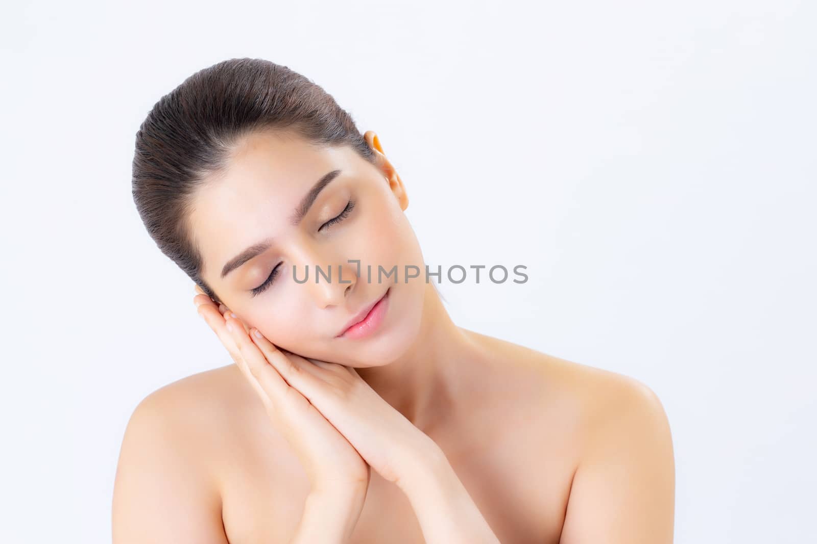 Portrait of beautiful woman asian makeup of cosmetic, girl hand touch cheek and smile attractive, face of beauty perfect with wellness isolated on white background with skin healthcare concept.