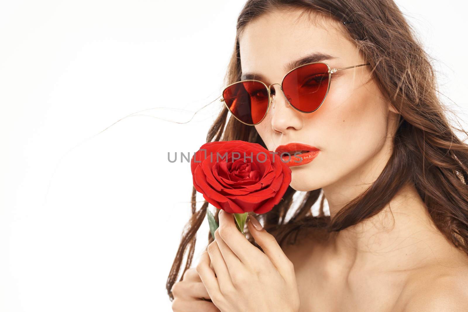 Brunette girl with red rose and sunglasses naked shoulders by SHOTPRIME