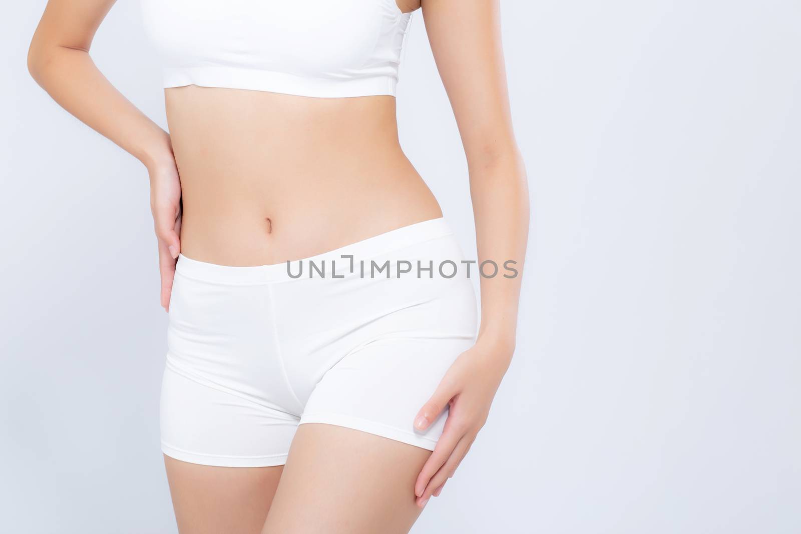 Closeup portrait young asian woman beautiful body diet with fit isolated on white background, model girl weight slim with health and wellness, weightloss concept.