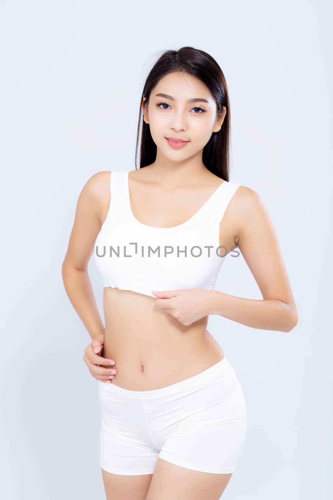 Portrait young asian woman smiling beautiful body diet with fit isolated on white background, model girl weight slim with cellulite or calories, health and wellness concept.