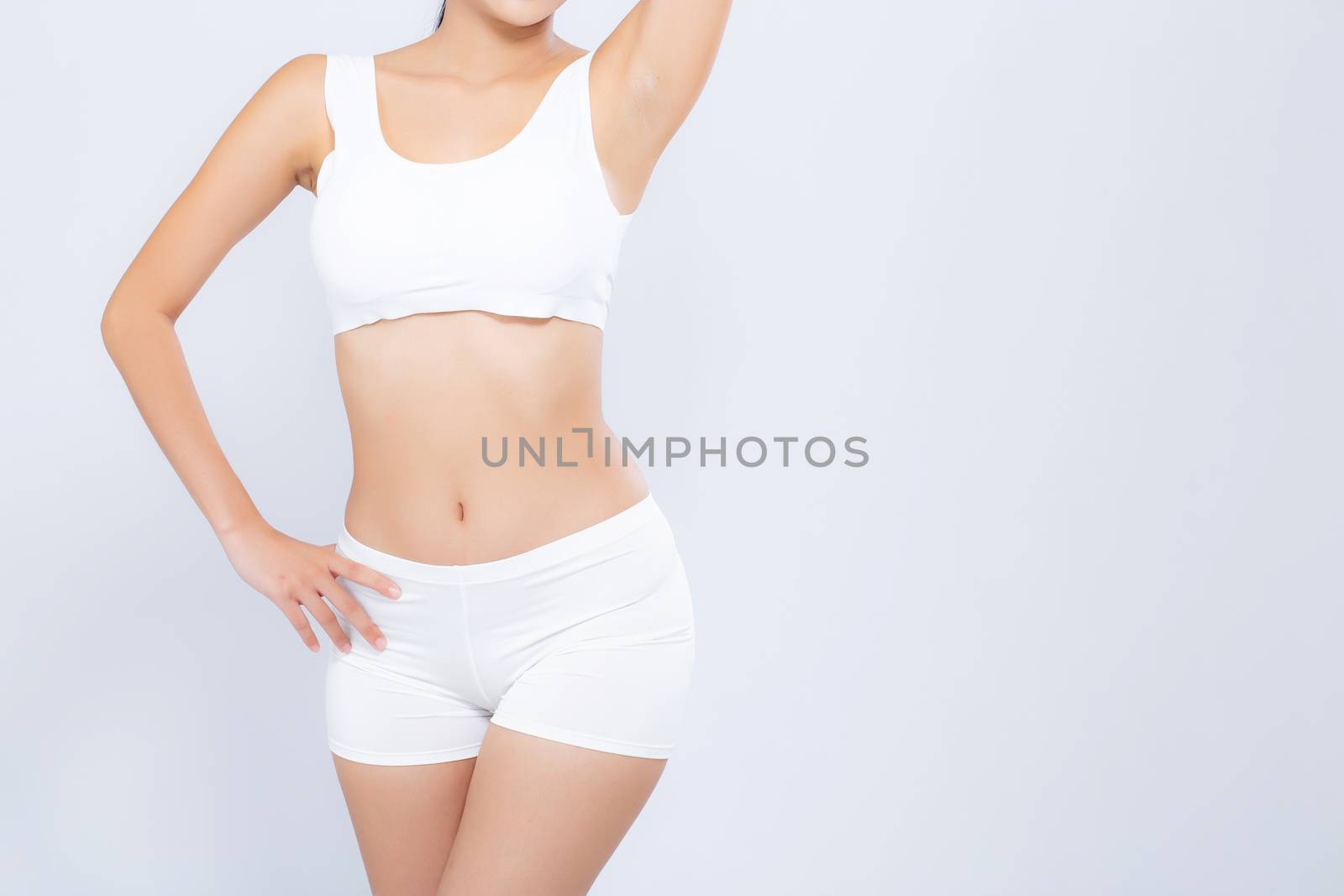 Closeup portrait young asian woman beautiful body diet with fit isolated on white background, model girl weight slim with health and wellness, weightloss concept.