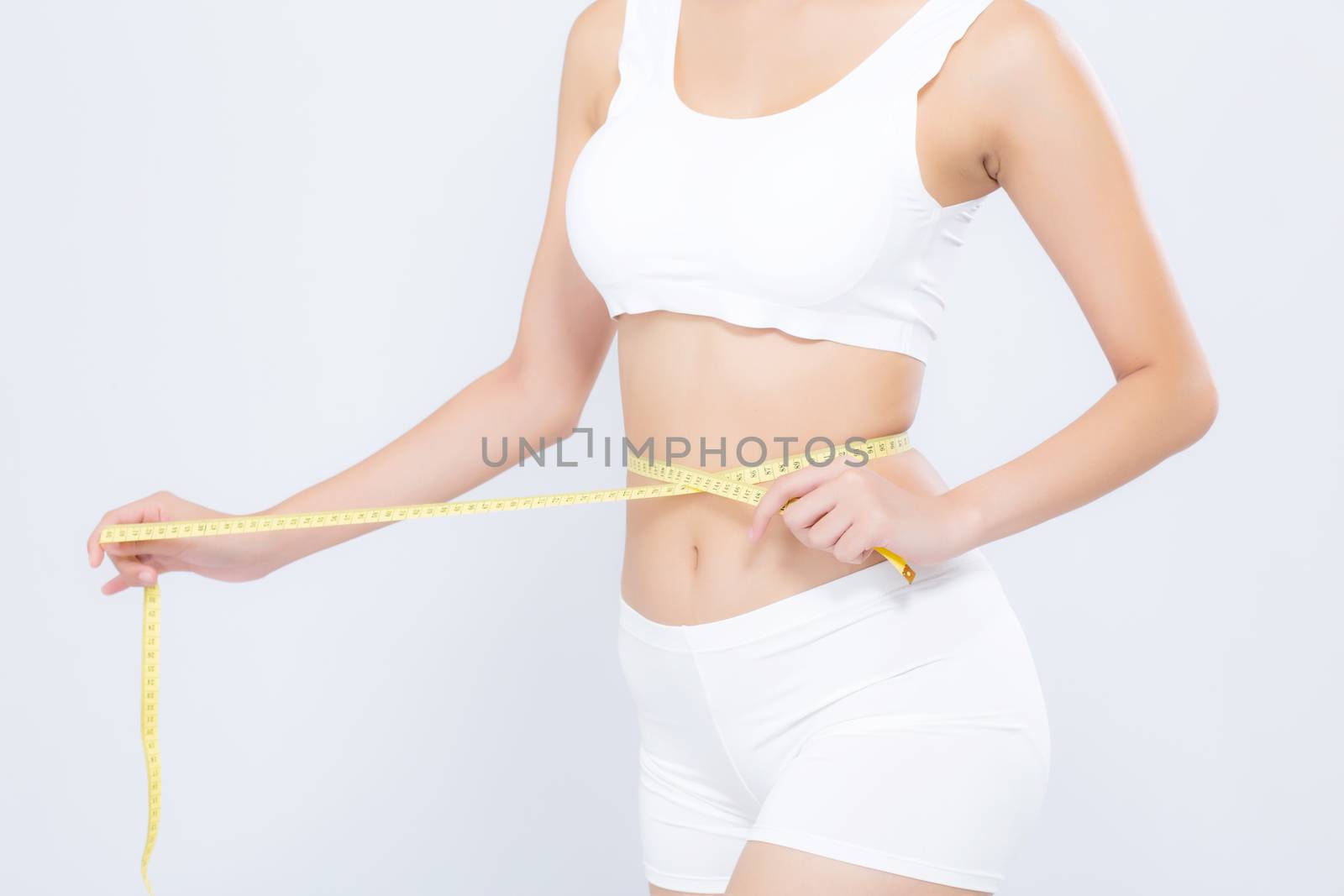Asian woman diet and slim with measuring waist for weight isolated on white background, girl have cellulite and calories loss with tape measure, health and wellness concept.