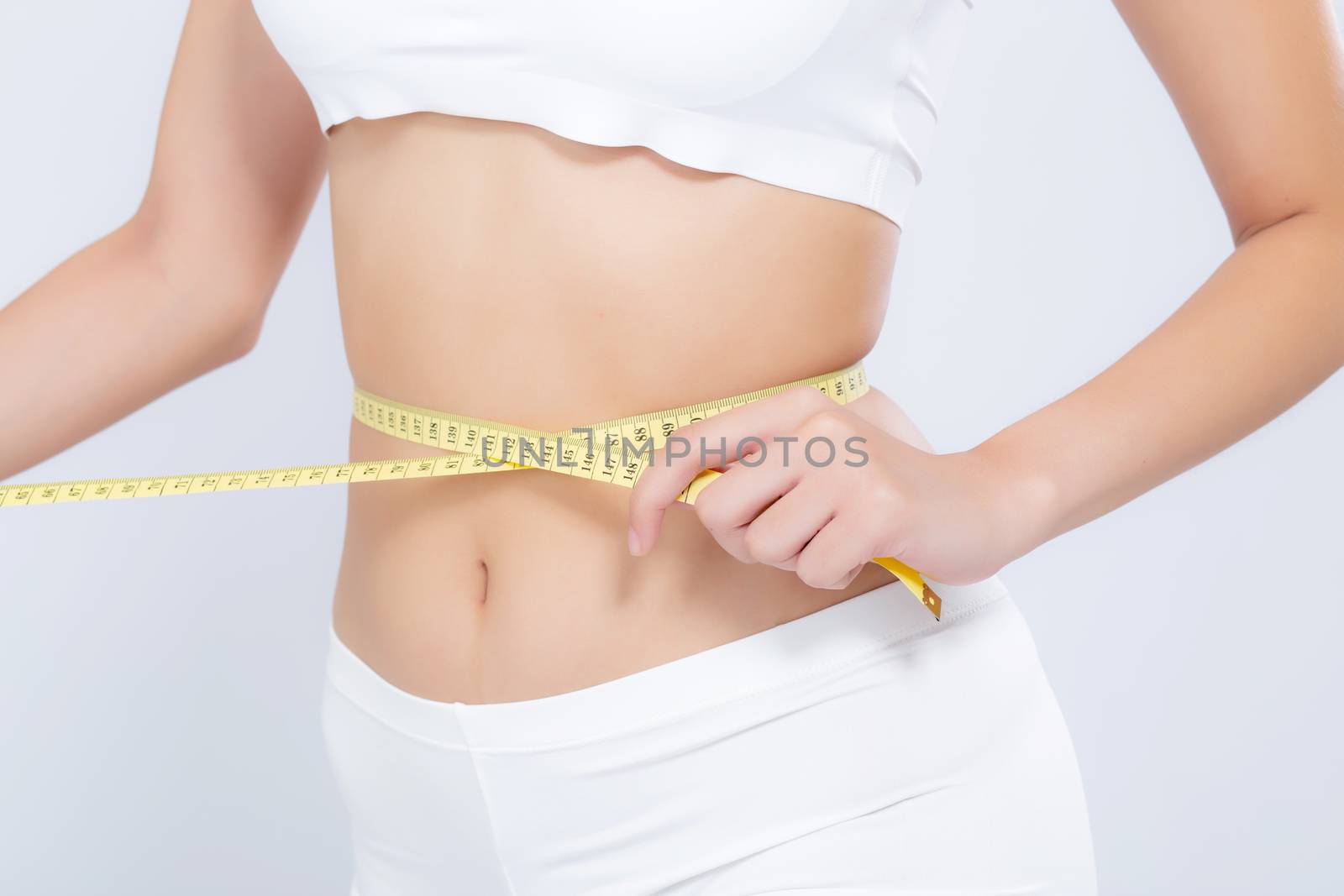 Asian woman diet and slim with measuring waist for weight isolated on white background, girl have cellulite and calories loss with tape measure, health and wellness concept.