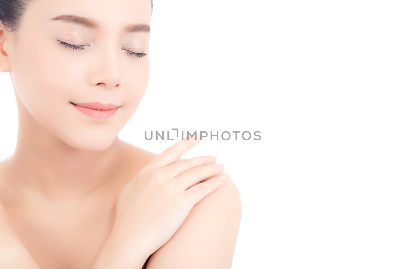 Portrait of beautiful asian woman makeup of cosmetic, girl touch shoulder and smile attractive, face of beauty perfect with wellness isolated on white background with skin healthcare concept.
