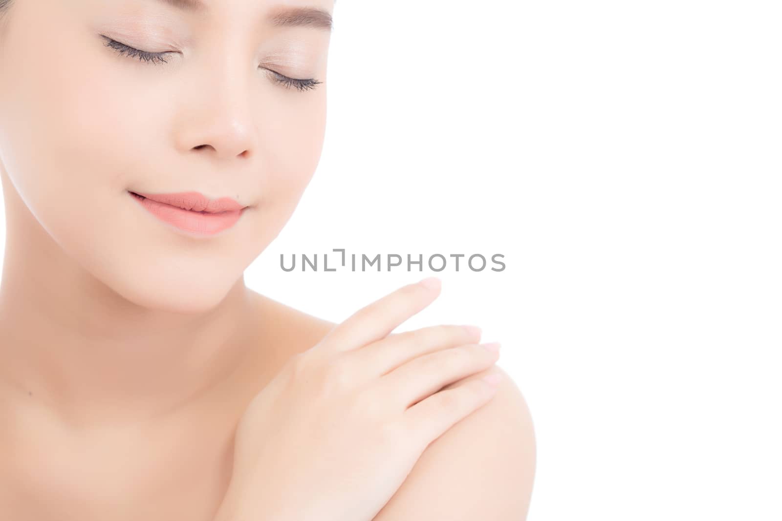 Portrait of beautiful asian woman makeup of cosmetic, girl touch shoulder and smile attractive, face of beauty perfect with wellness isolated on white background with skin healthcare concept.