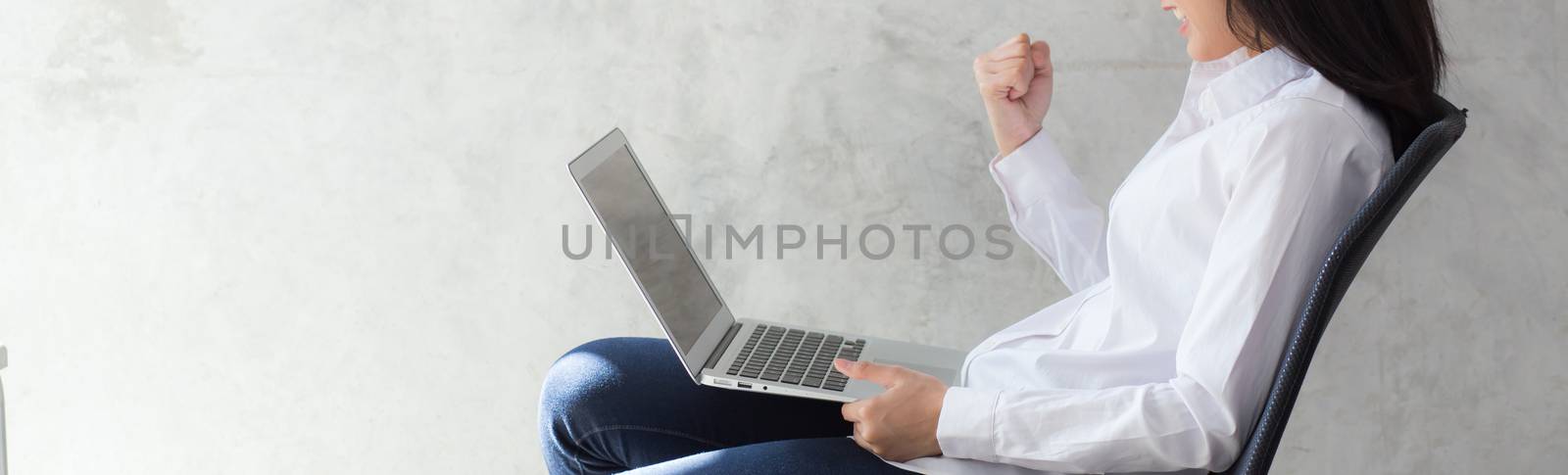Banner website beautiful asian young woman excited and glad of success with laptop, girl working coffee shop on cement background, career freelance business concept.