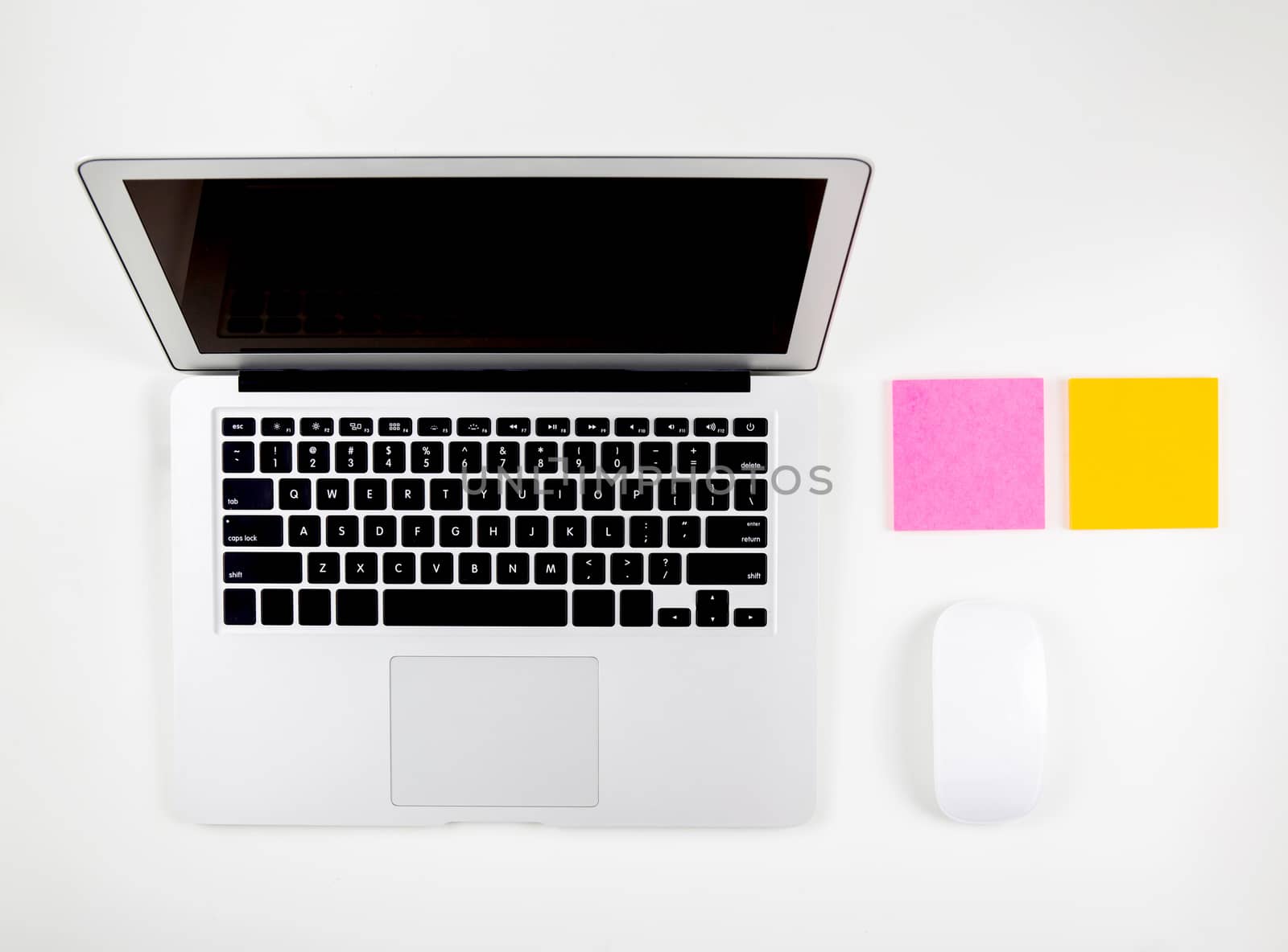Top view of laptop computer with open display screen monitor, mouse and notepad isolated on white background, notebook or netbook with keyboard, communication technology concept.