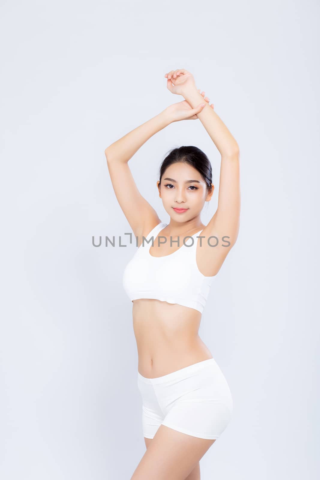 Portrait young asian woman smiling beautiful body diet with fit isolated on white background, model girl weight slim with cellulite or calories, health and wellness concept.