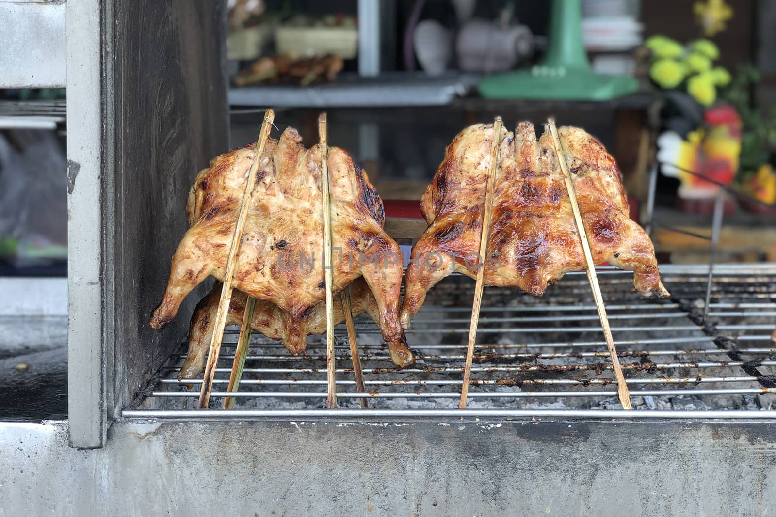 Grilled chicken. Thai food Local northeast street food. by Surasak