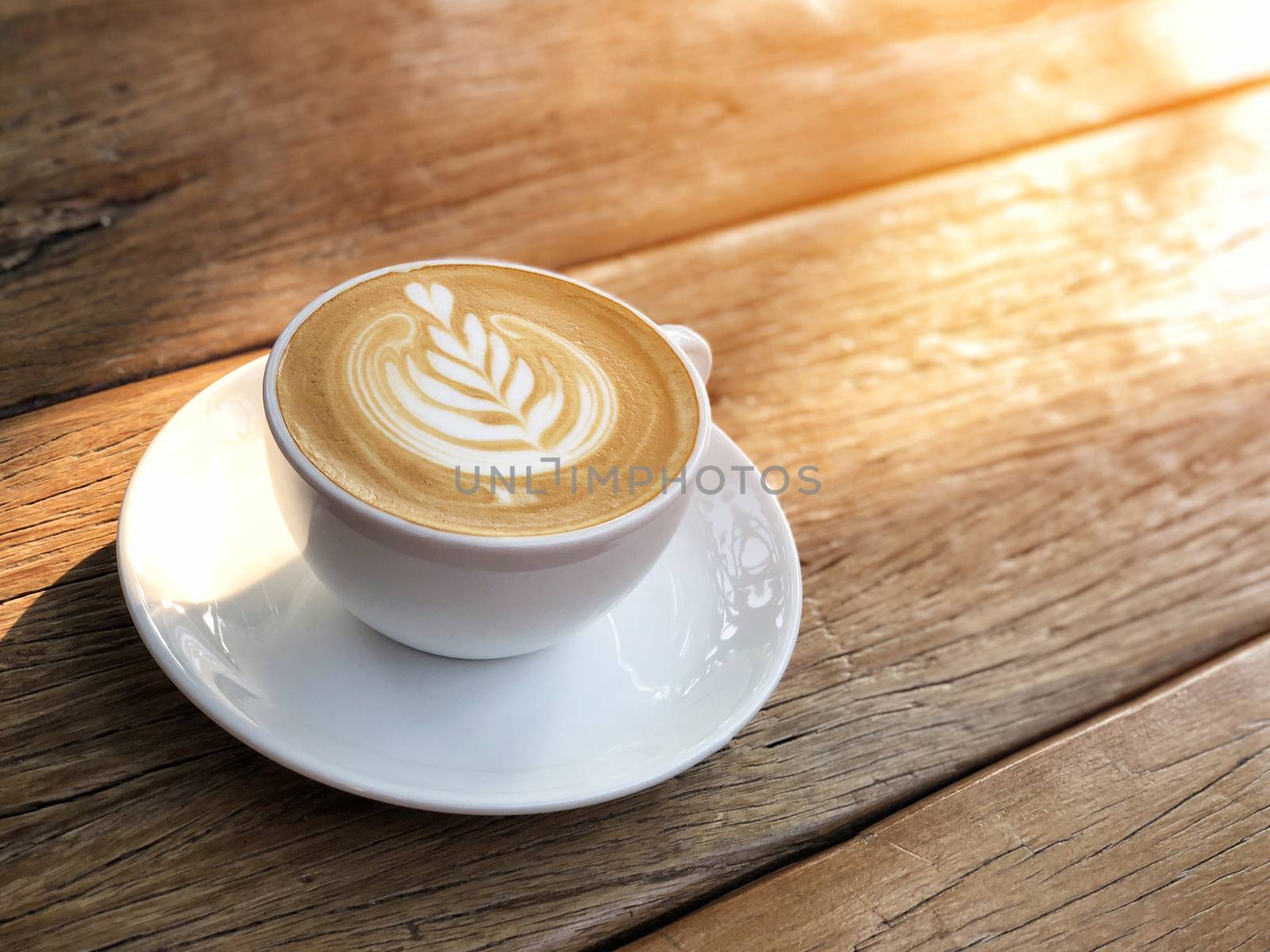 Coffee cup latte art in morning