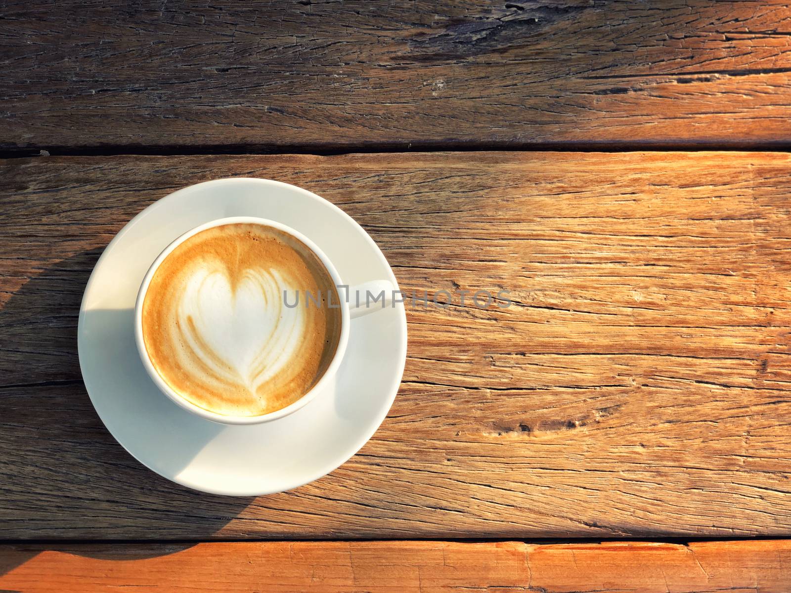 Coffee cup latte art in morning