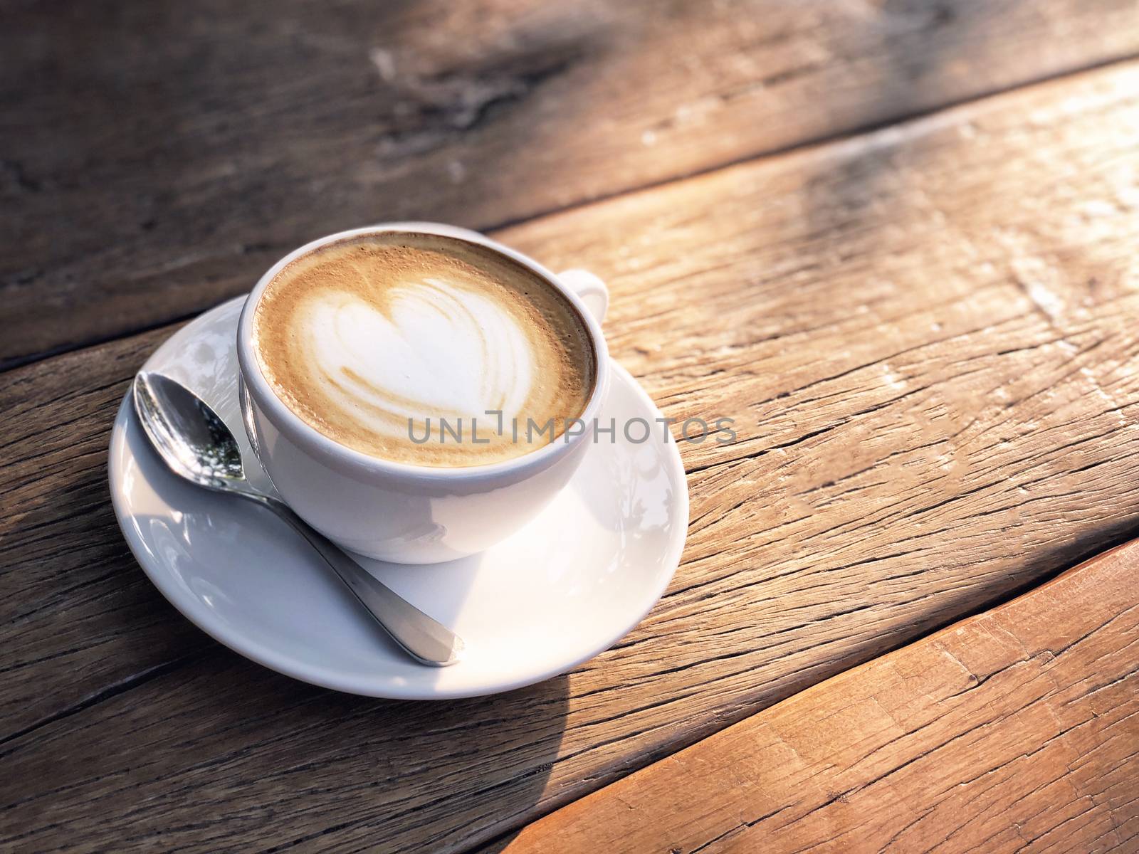 Coffee cup latte art in morning