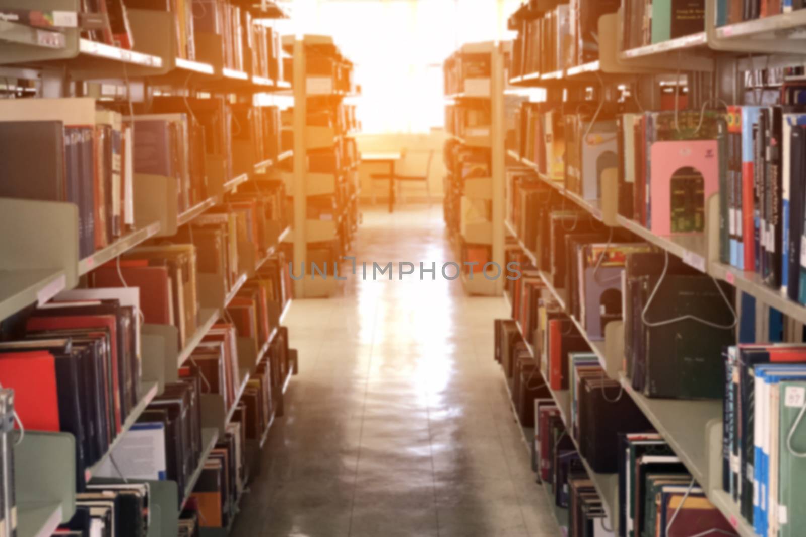 Bookshelf in public library. Blur effect. Background.