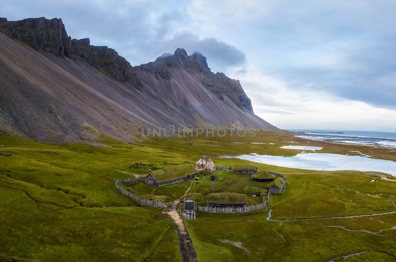 Aerial view of a viking village in Stokksnes under Vestrahorn mountain, Iceland by nickfox