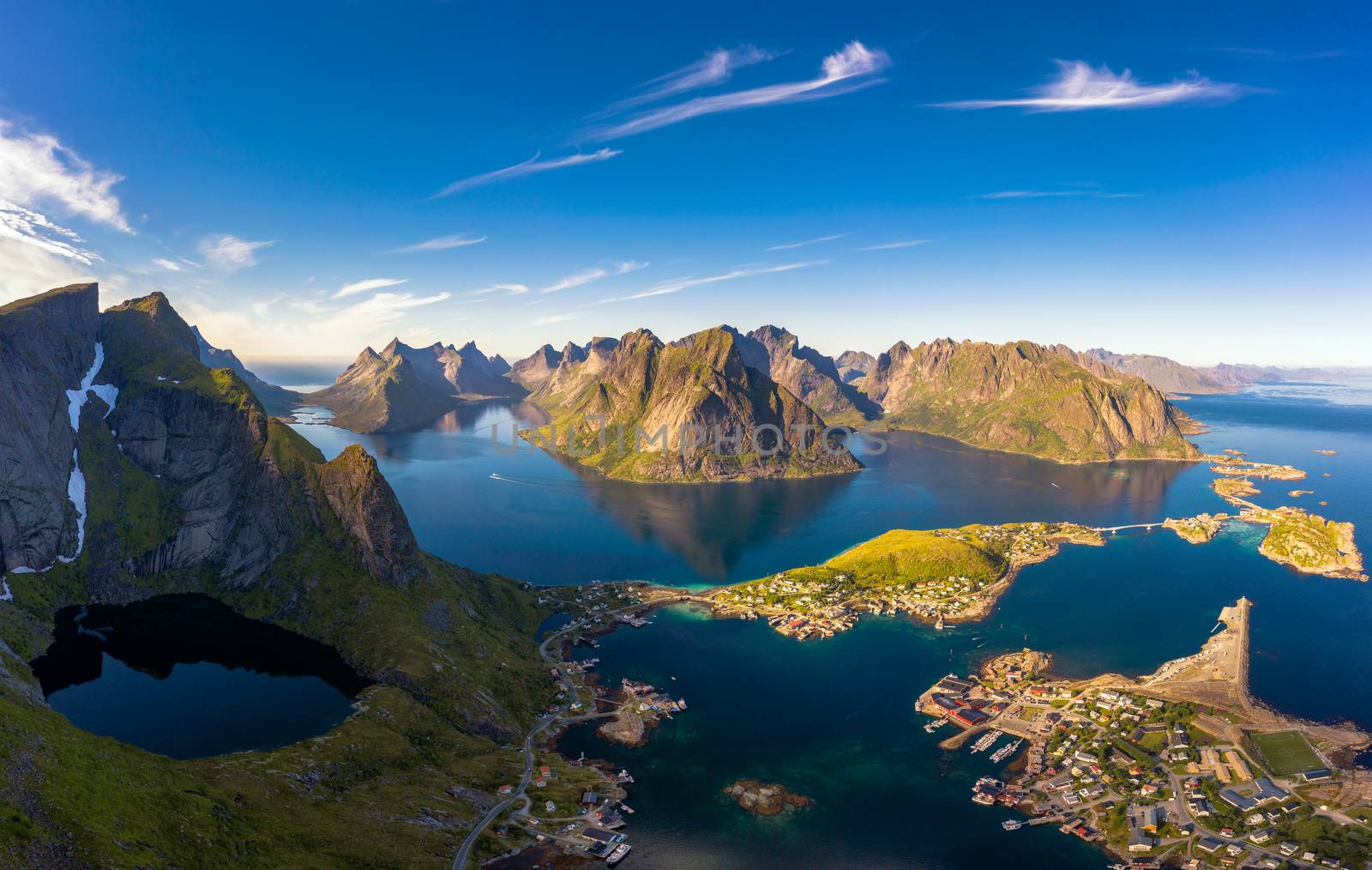 Panorama of mountains, fjords and fishing villages in Lofoten islands, Norway by nickfox