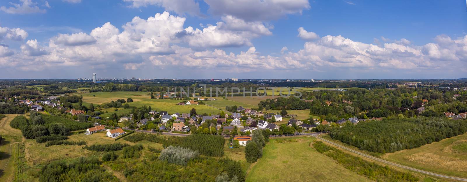 Aerial high angle of De Pinte aerea, agricultural village near Ghent, Belgium. Drone point of view.