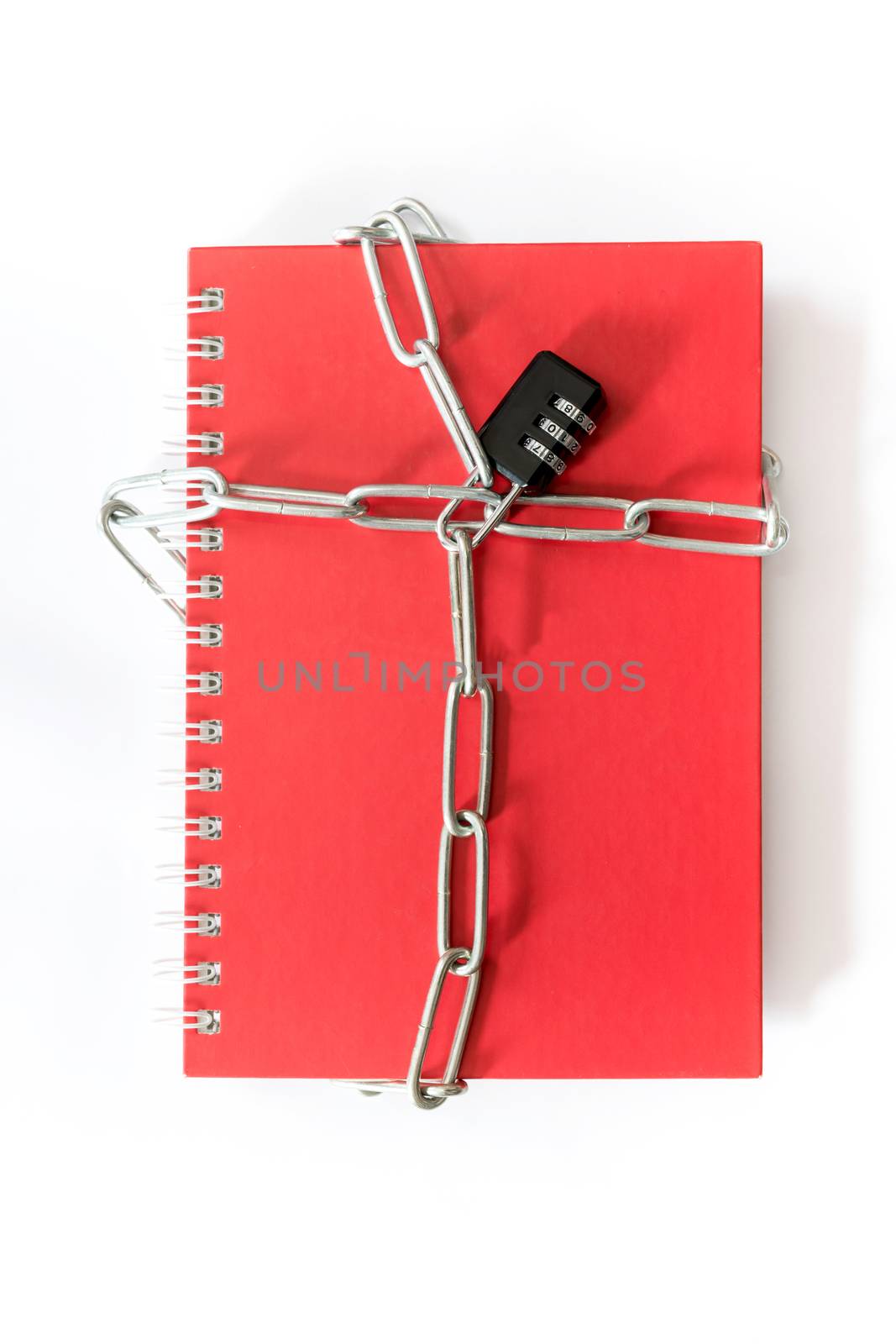 Note Book red lock with a key chain on white background.