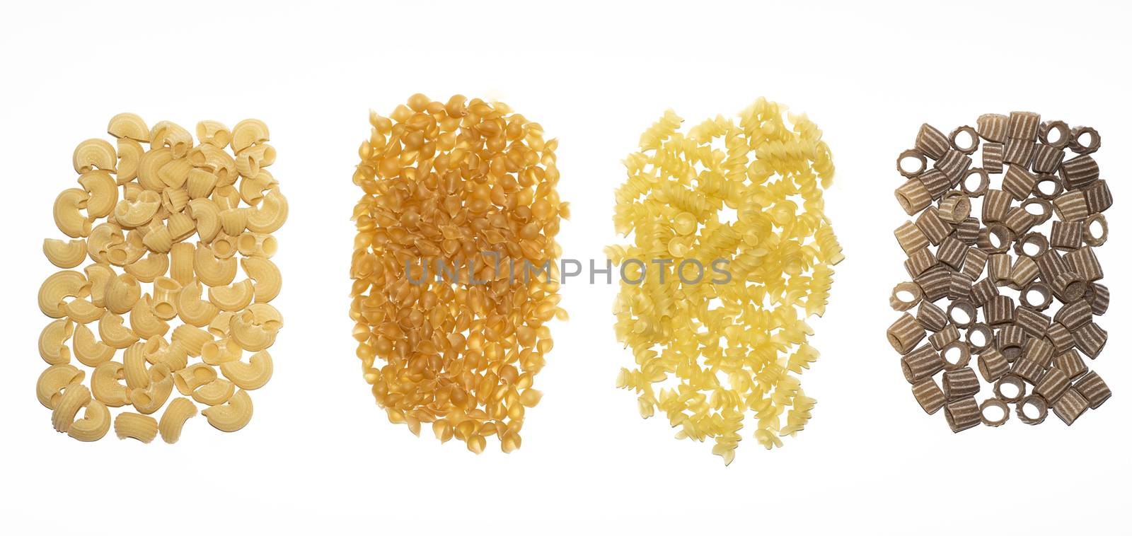 Closeup detail of four pasta types isolated on a white background abstract food image