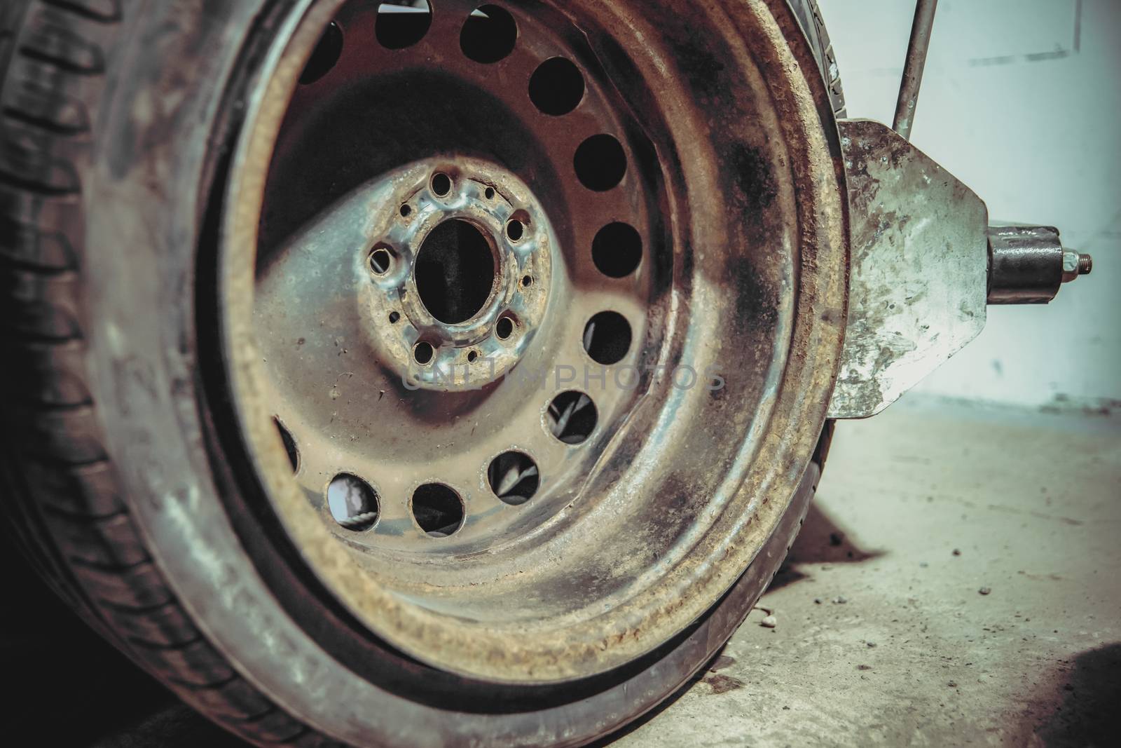 replacement of tires on car wheels.