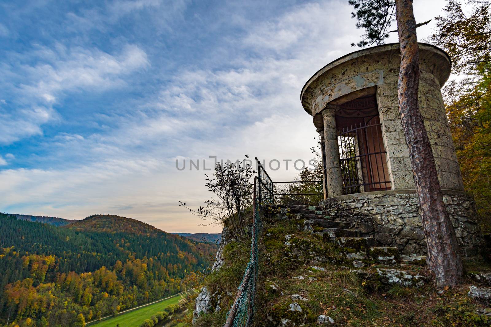 Viewpoint at the temple of the military cemetery in the Danube valley near Beuron in autumn with a view of the monastery and the colorful valley