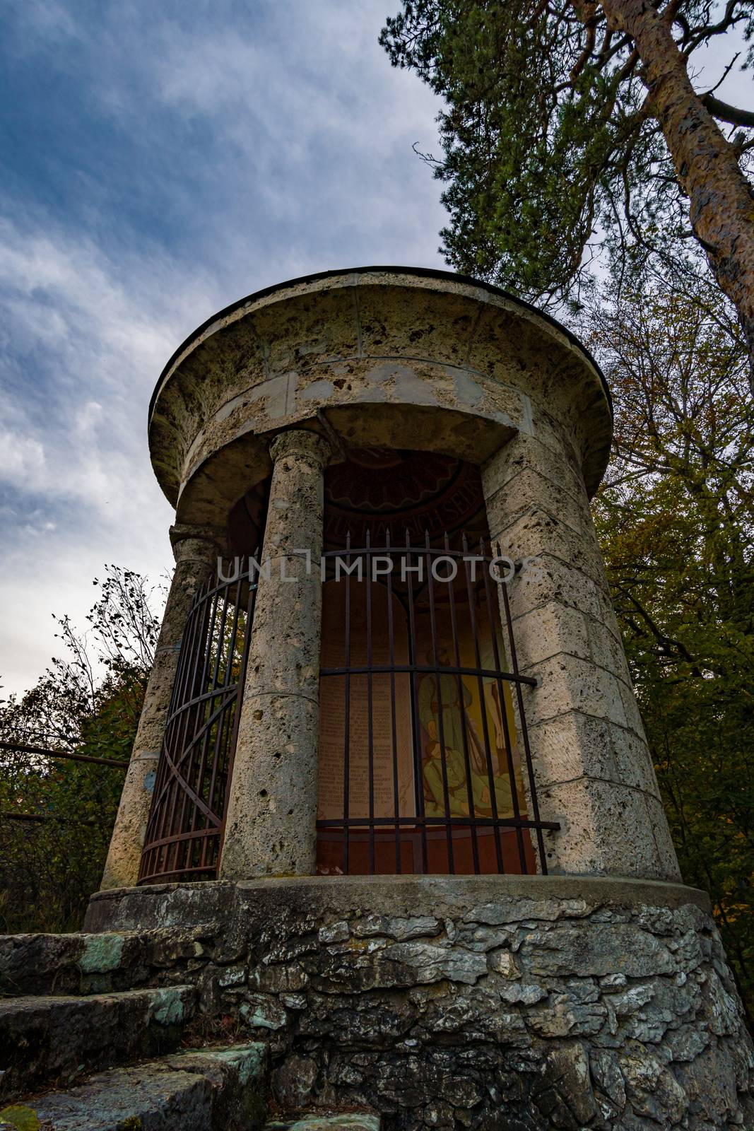 Viewpoint at the temple of the military cemetery in the Danube valley near Beuron in autumn with a view of the monastery and the colorful valley