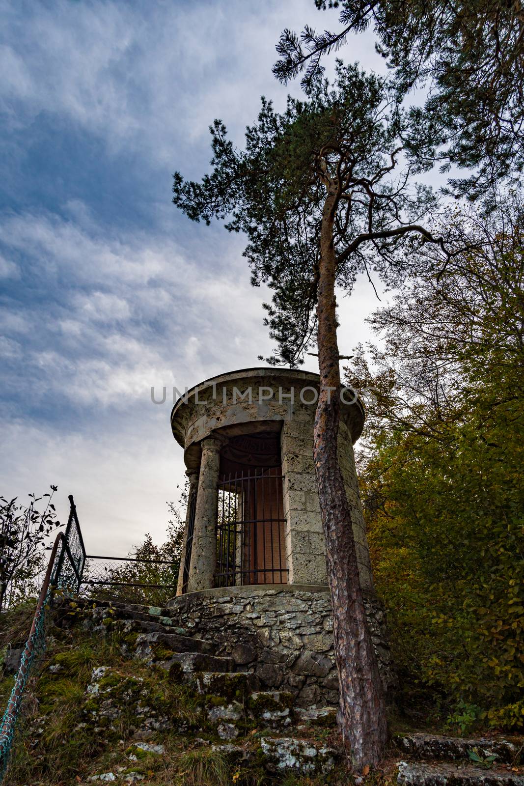 Viewpoint at the temple of the military cemetery in the Danube valley near Beuron in autumn with a view of the monastery and the colorful valley