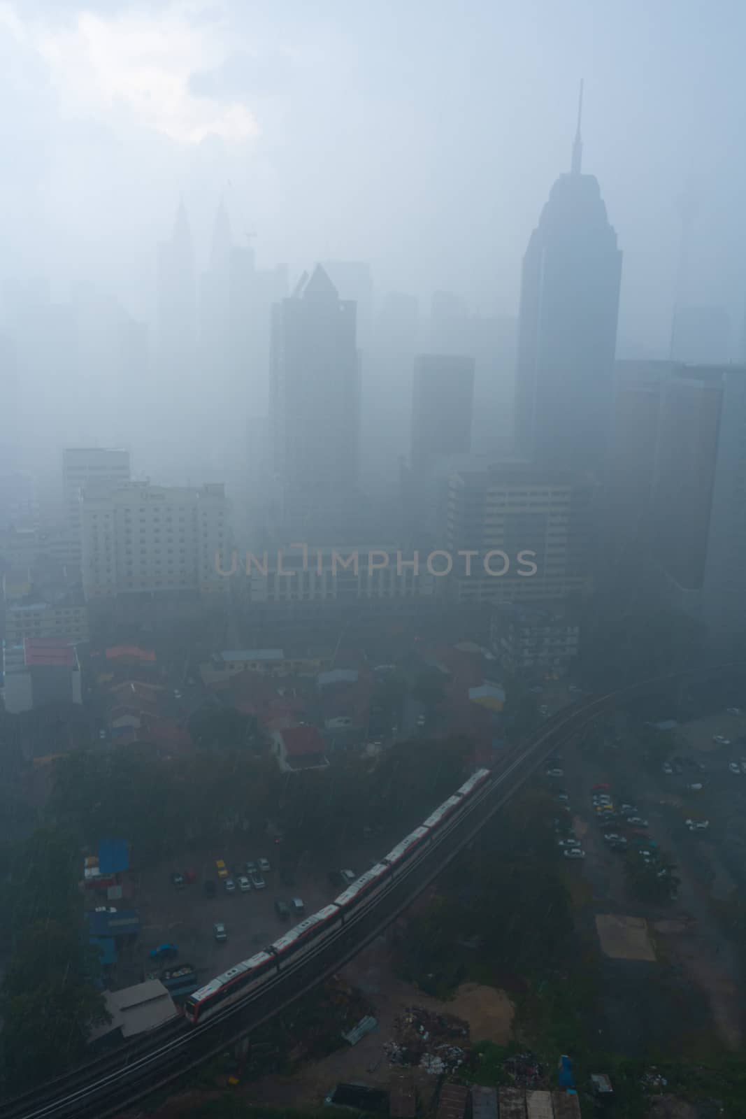 Heavy fog landscape of Kuala Lumpur city center.