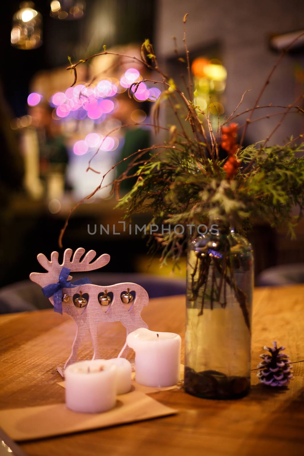 Minimalistic Christmas decor cozy warm room with wooden furniture.