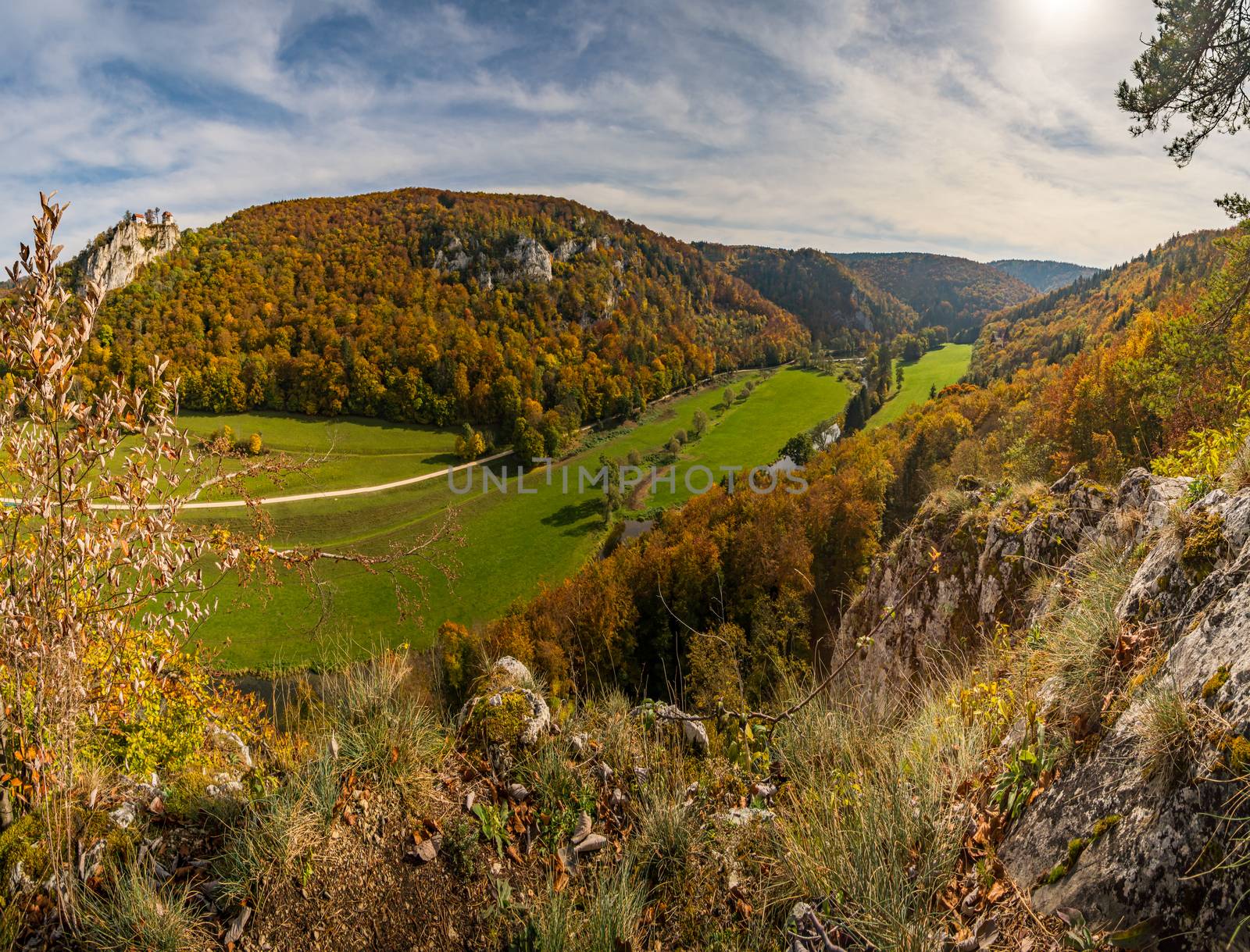 Colorful view of Bronnen Castle on the hiking trail in autumn in the Danube valley near Beuron by mindscapephotos