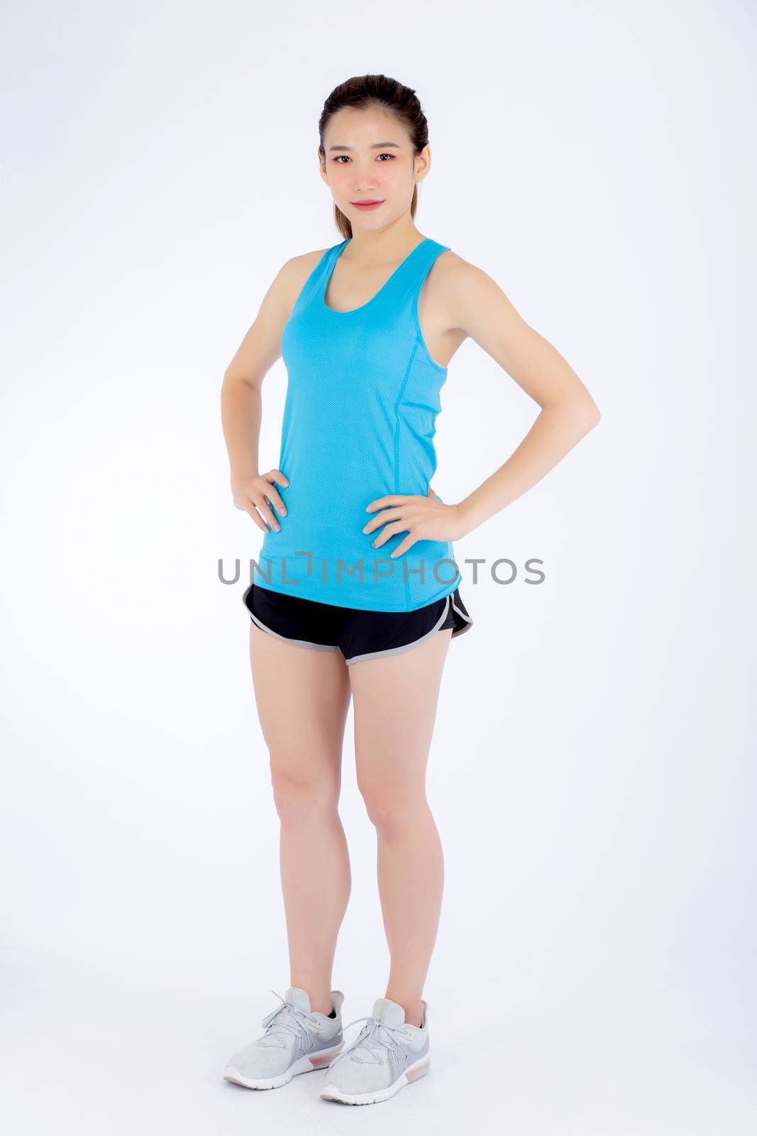 Full-length beautiful portrait young asian woman in sport clothing with satisfied and confident isolated on white background, girl asia have shape and wellness, exercise for fit with health concept.