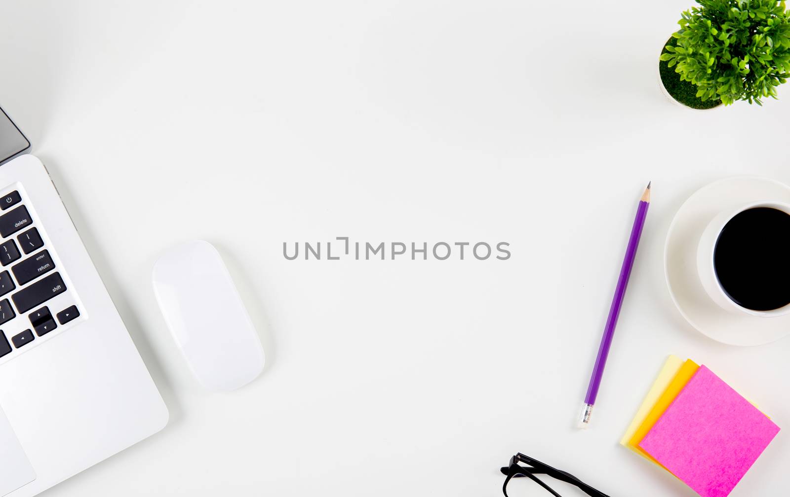 Top view of laptop computer with open display screen monitor, mouse and notepad, glasses and pencil isolated on white background, notebook or netbook with keyboard, communication technology concept.