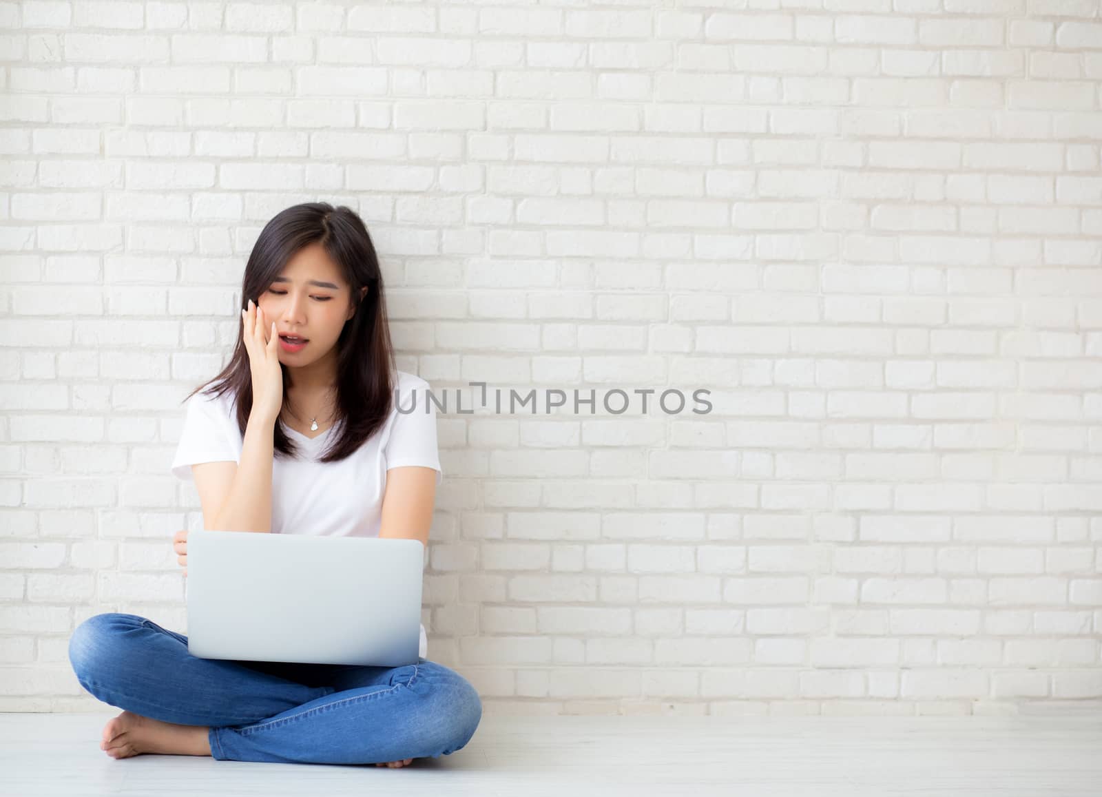Beautiful of portrait asian young woman working online laptop an by nnudoo