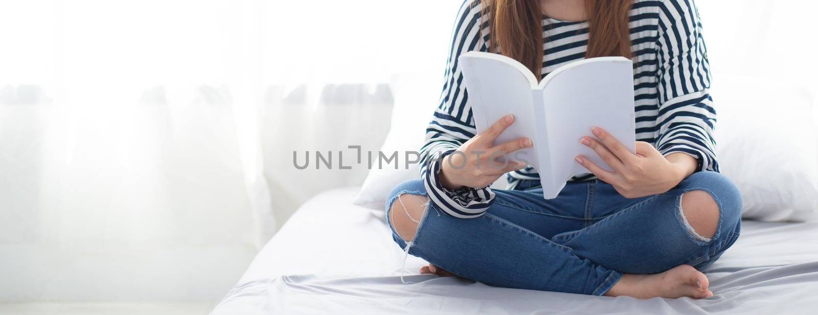 Banner website beautiful asian woman relax sitting reading book on bedroom at home, girl study literature, education and llifestyle concept.