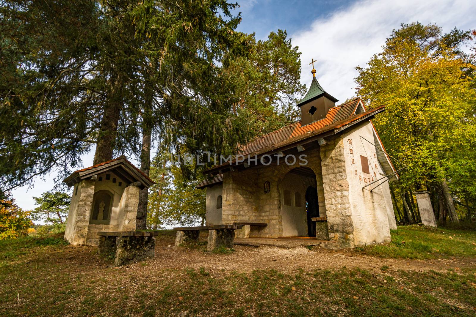 Trinity Chapel on the hiking trail in the Danube Valley in colorful autumn near Beuron in the Sigmaringen district